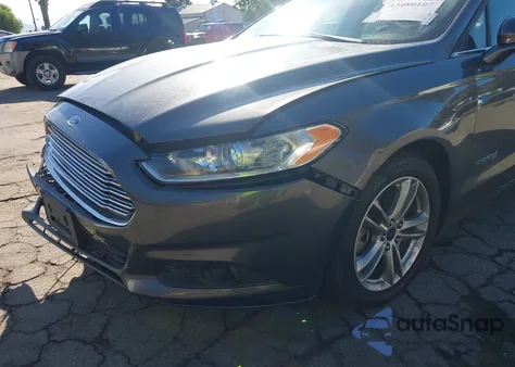 2016 Ford Fusion Hybrid Se z USA, uszkodzony, nr VIN 3FA6P0LU9GR398815